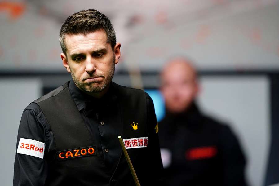 A frustrated Mark Selby in action against Luca Brecel