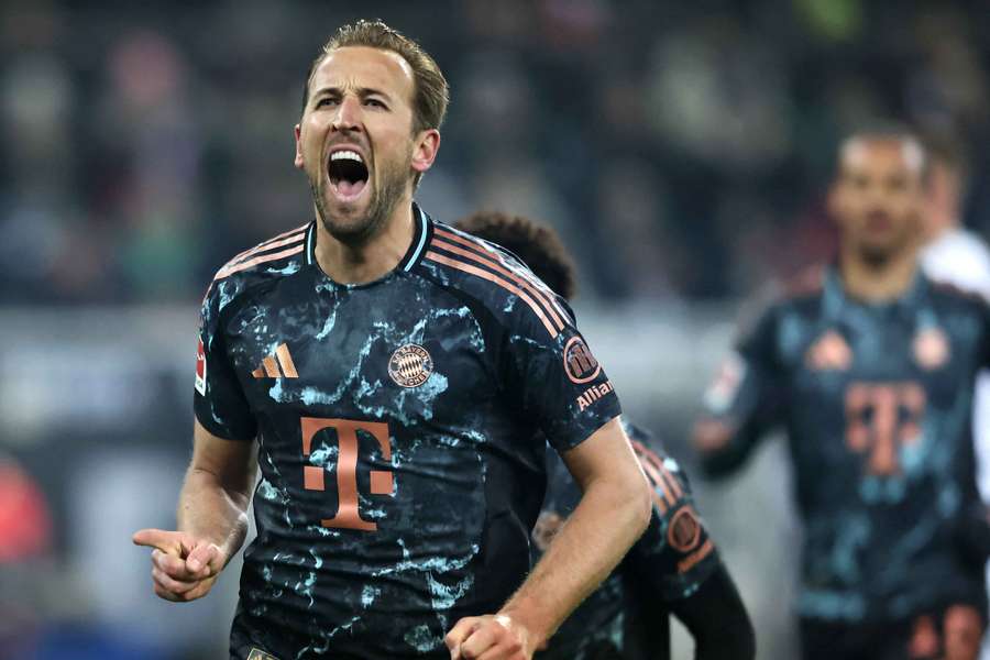 Harry Kane celebrates scoring the penalty spot