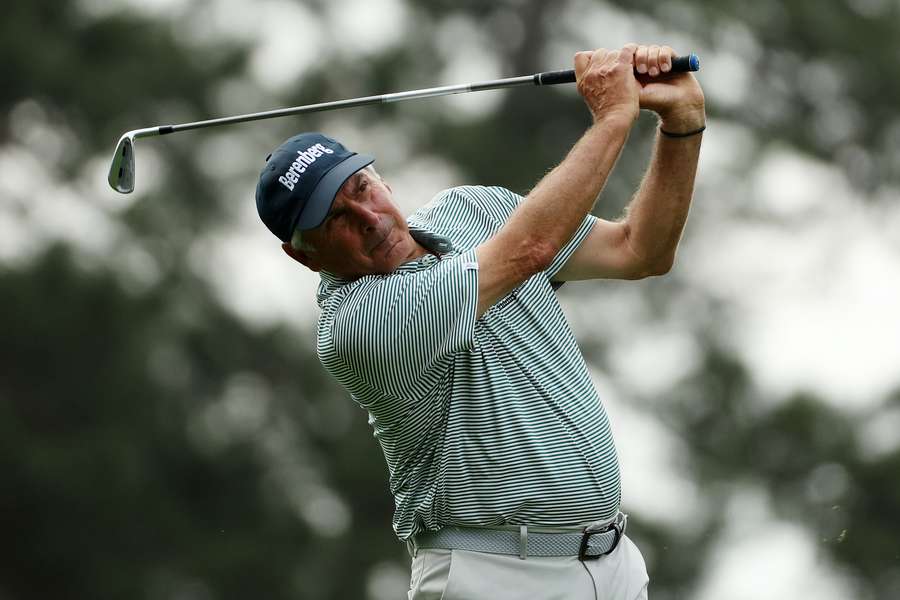 Fred Couples plays his shot from the fourth tee