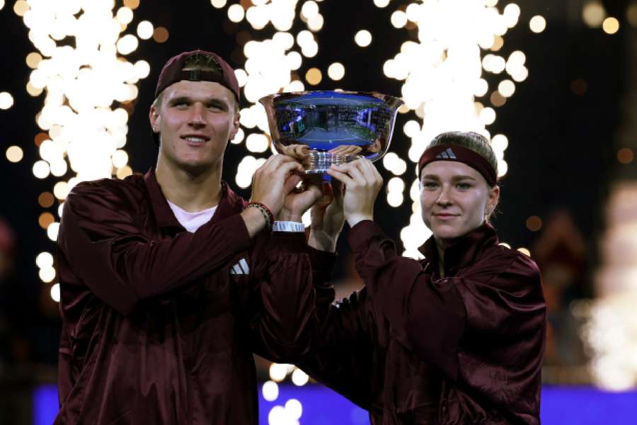 Mensik and Muchova lift the mixed doubles trophy Mensik and Muchova lift the mixed doubles trophy
