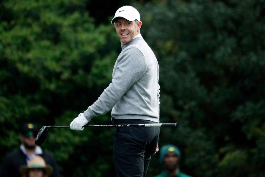 Rory McIlroy reacts after his tee shot on the 11th hole during a practice round