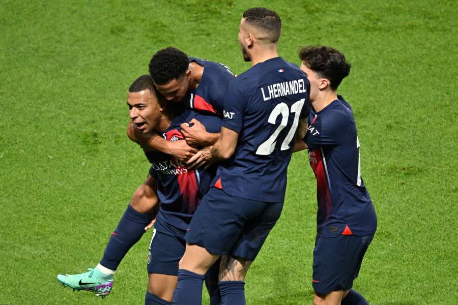 Kylian Mbappe celebrates scoring his team's first goal