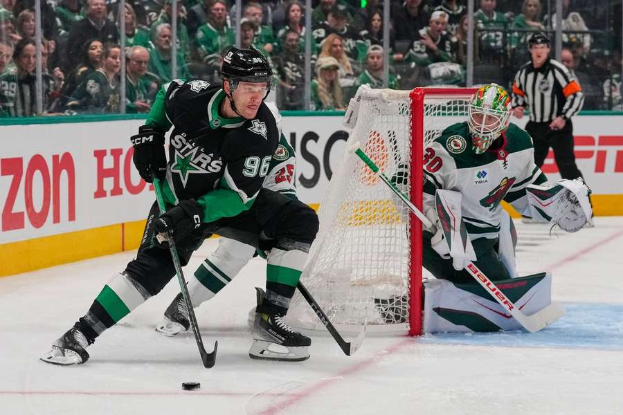 Stars' Mikko Rantanen skates by Wild goalie Jesper Wallstedt during Game 2