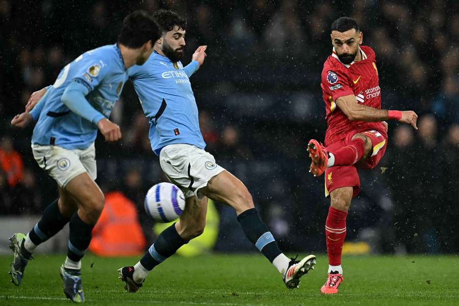 Mohamed Salah has a shot at goal when the sides met in February Mohamed Salah has a shot at goal when the sides met in February