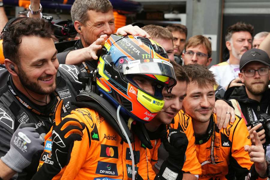 Oscar Piastri celebrates with teammates after winning the Belgian Grand Prix Oscar Piastri celebrates with teammates after winning the Belgian Grand Prix