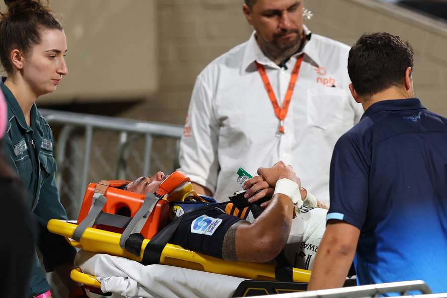 Brumbies flyhalf Noah Lolesio is seen being stretchered off in a neck brace during the weekend Super Rugby clash against the Force.