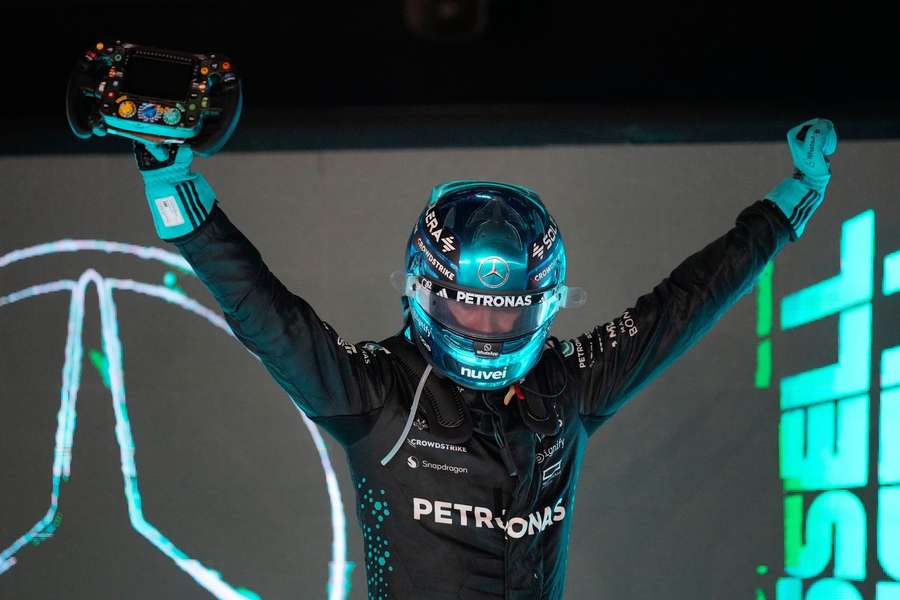George Russell celebrates after winning the Singapore Grand Prix