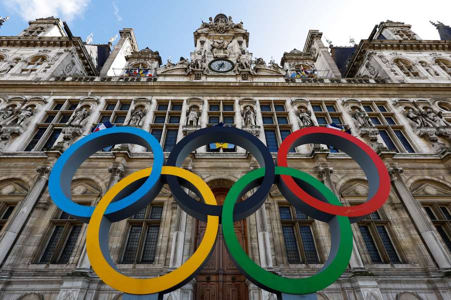 The Olympic rings are seen in front of the Hotel de Ville City Hall in Paris