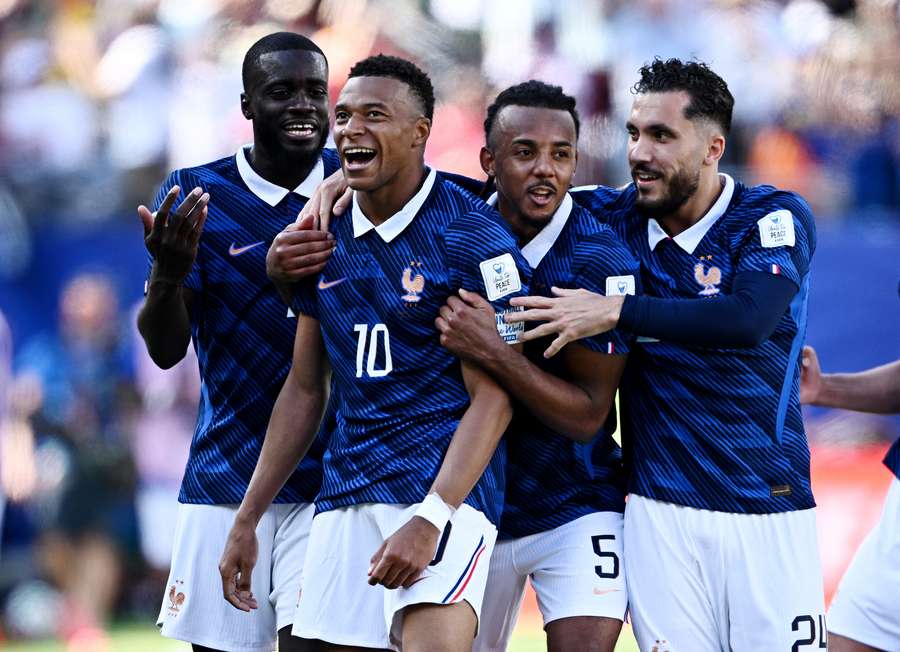 Kylian Mbappe celebrates scoring their third goal with Dayot Upamecano, Jules Kounde and Rayan Cherki Kylian Mbappe celebrates scoring their third goal with Dayot Upamecano, Jules Kounde and Rayan Cherki