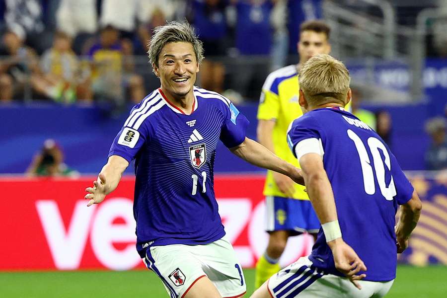 Daizen Maeda's opening goal was enough to secure Japan second place in Group F.