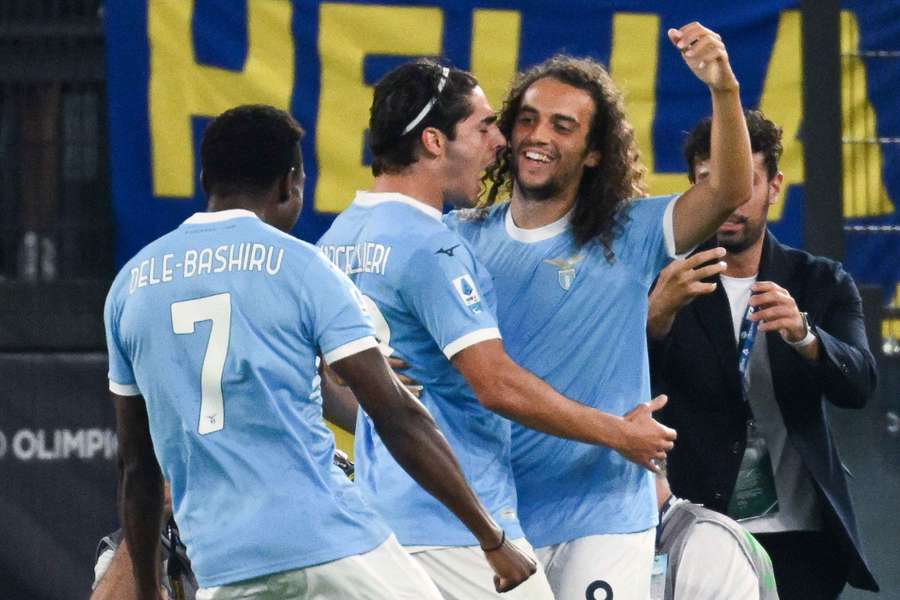 Matteo Guendouzi celebrates with teammates after scoring the opening goal
