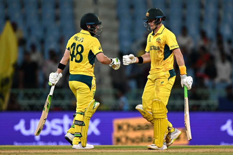 Australia's Josh Inglis (L) and Marnus Labuschagne bump their fists