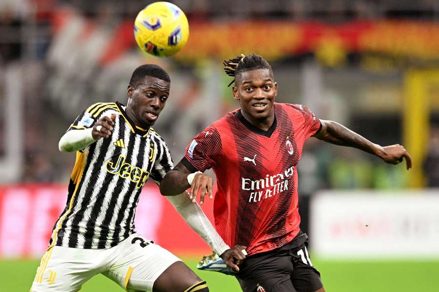 AC Milan's Rafael Leao tussles with Juventus' Timothy Weah earlier this season