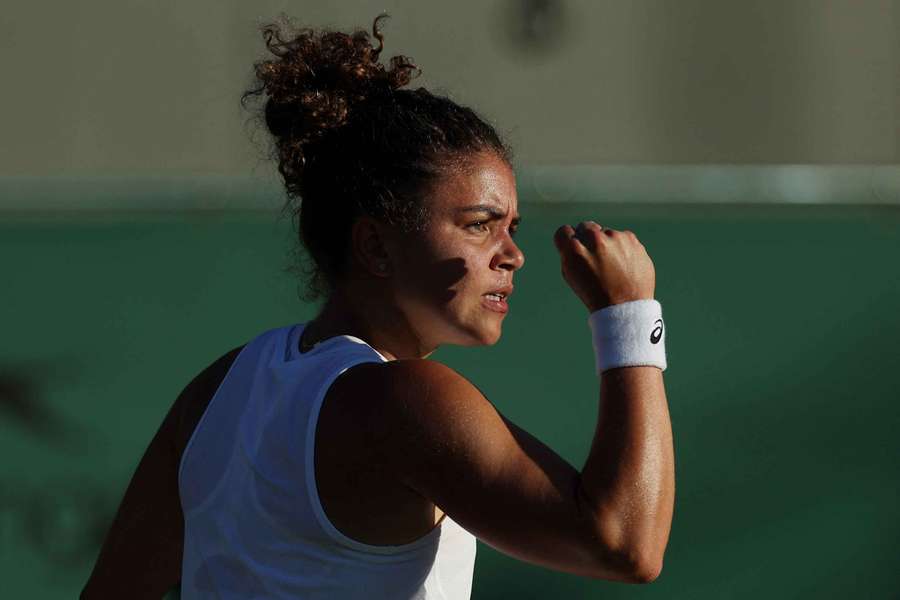 Jasmine Paolini reacts during her first-round match against Latvia's Anastasija Sevastova