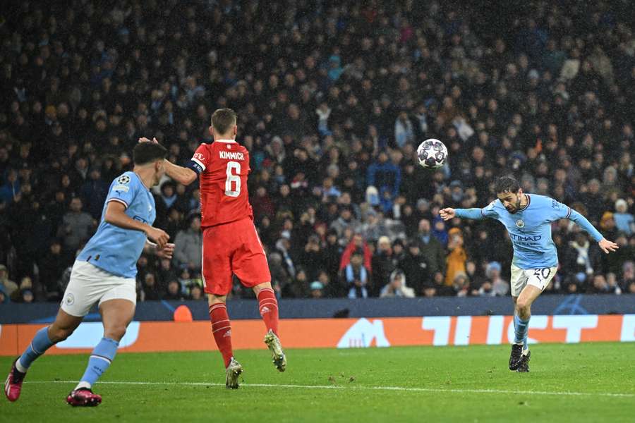 Manchester City's Portuguese midfielder Bernardo Silva heads home their second goal