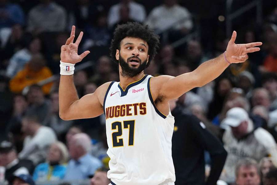 Jamal Murray, dos Nuggets, faz a sua pose característica na vitória sobre os Pacers Jamal Murray, dos Nuggets, faz a sua pose característica na vitória sobre os Pacers