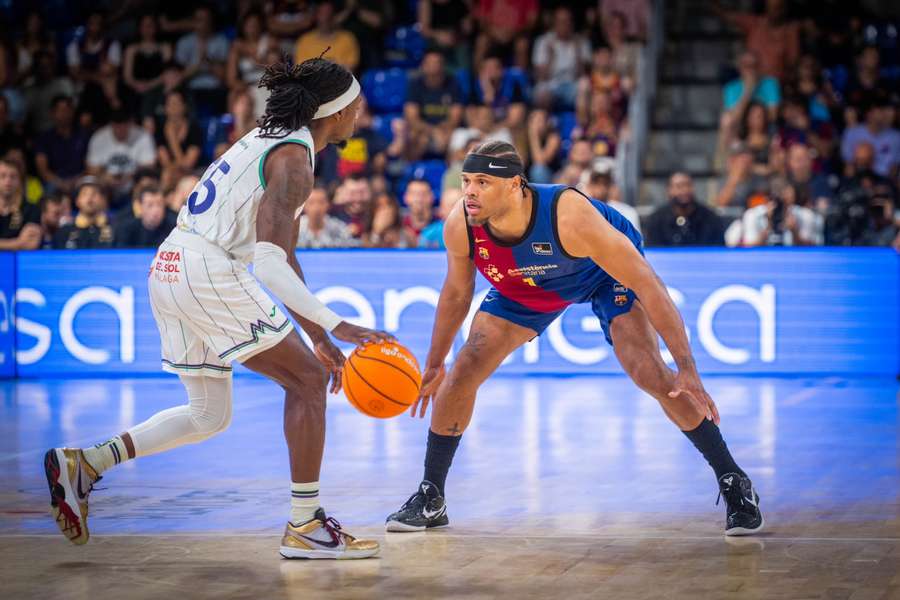 Kendrick Perry ante Justin Anderson, en el Barcelona-Unicaja del viernes
