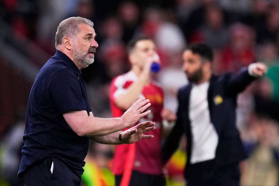 Ange Postecoglou talks with his Tottenham players during the Europa League final Ange Postecoglou talks with his Tottenham players during the Europa League final