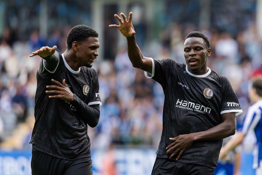 Josue Vergara (L) and Hyllarion Goore of Gent celebrate Gent's goal Josue Vergara (L) and Hyllarion Goore of Gent celebrate Gent's goal