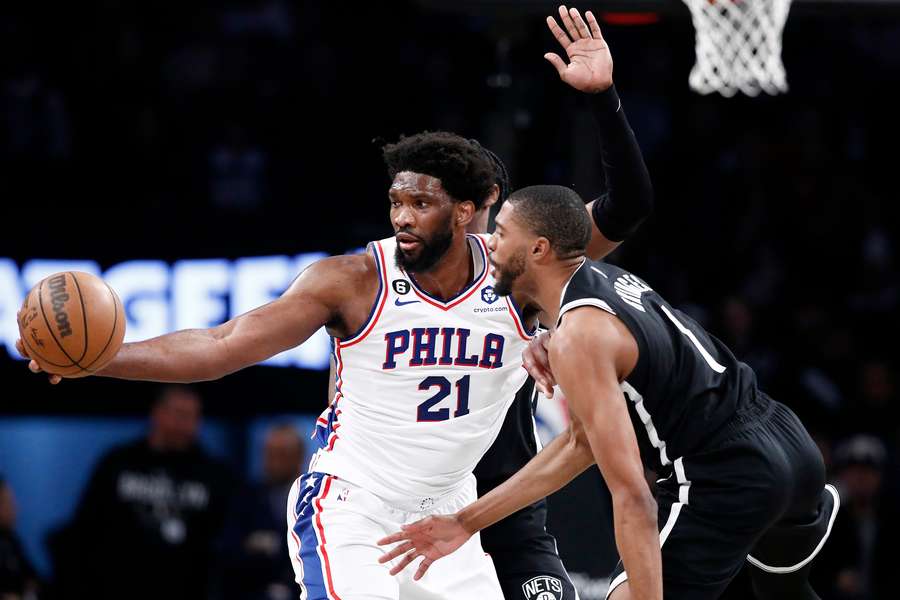 Philadelphia's Joel Embiid drives against Brooklyn's Mikal Bridges in the 76ers' 102-97 NBA play-off victory over the Nets