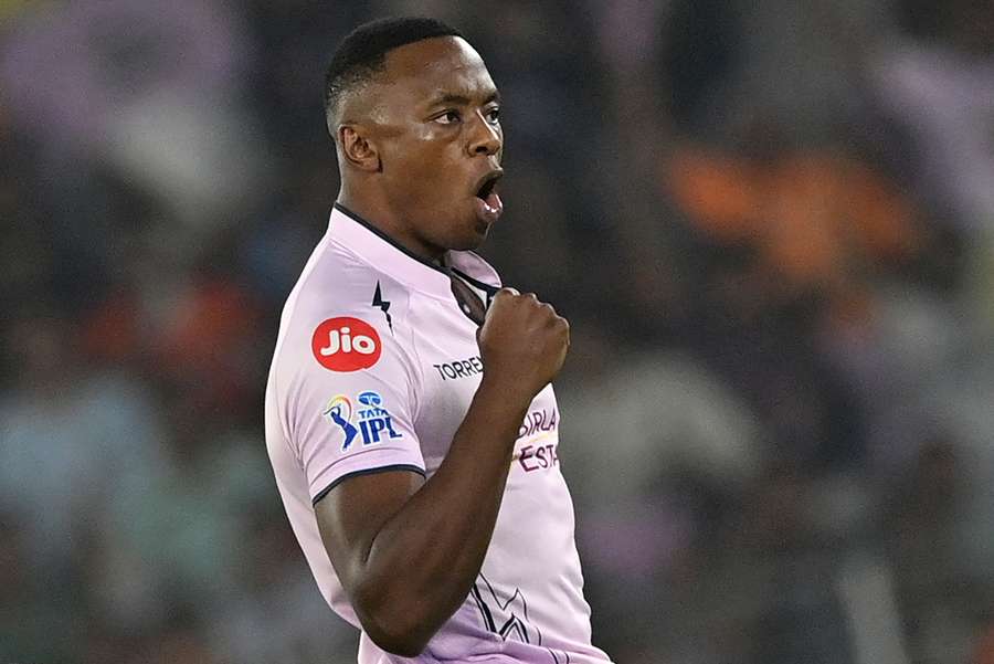 Gujarat Titans' Kagiso Rabada celebrates after taking the wicket of Sunrisers Hyderabad's Abhishek Sharma