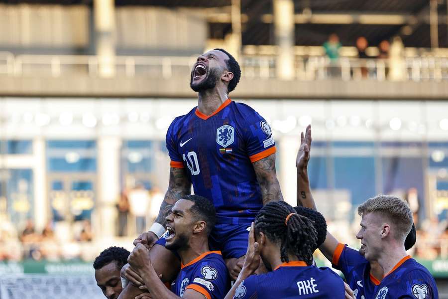 Memphis Depay celebrates after scoring his 51st goal for the Netherlands to give his side a 1-0 lead after 11 minutes