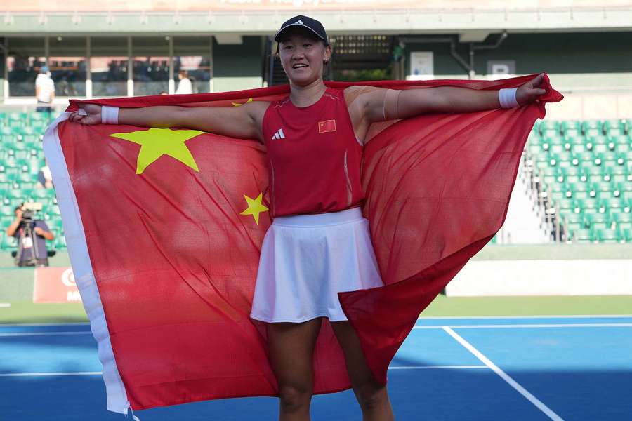 Wang Xiyu celebrates after winning the women's singles gold at the Asian Games Wang Xiyu celebrates after winning the women's singles gold at the Asian Games