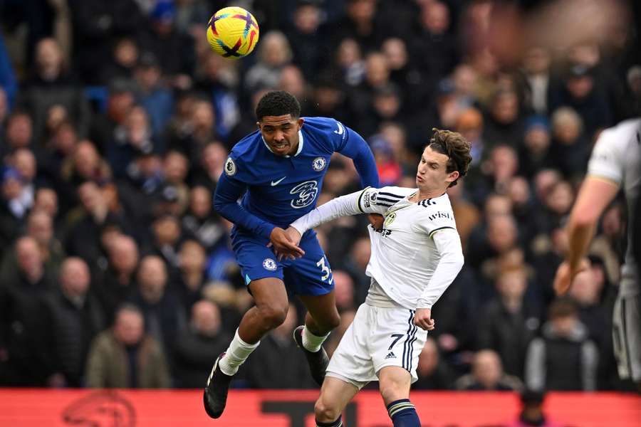 Chelsea's French defender Wesley Fofana (L) vies with Leeds United's US midfielder Brenden Aaronson (R) 