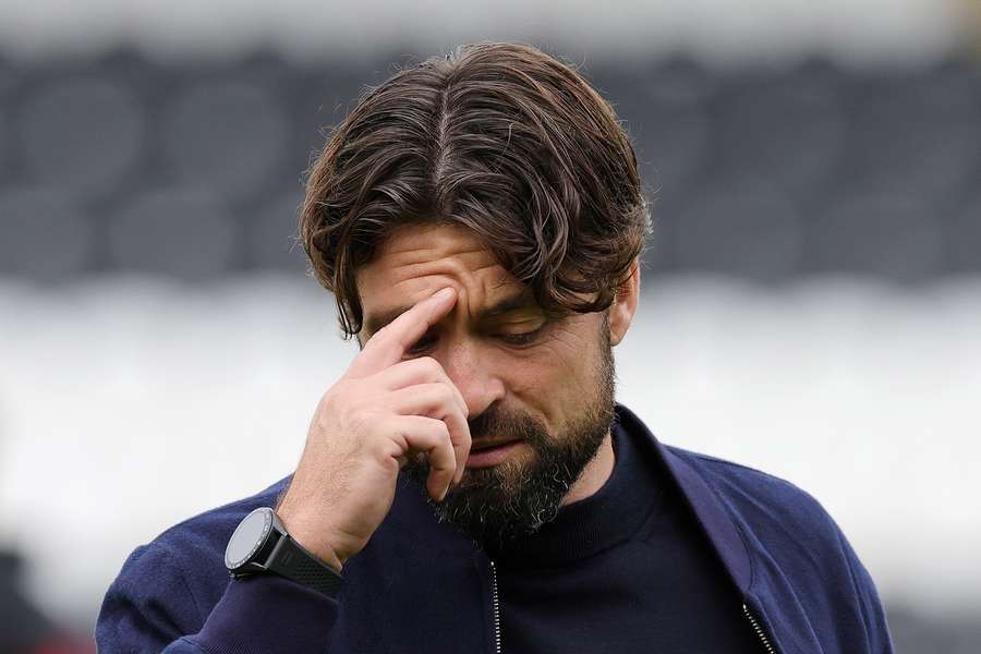 Rangers manager Russell Martin appears dejected