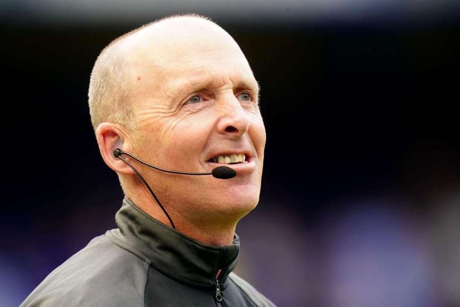 Bývalý rozhodčí Mike Dean.