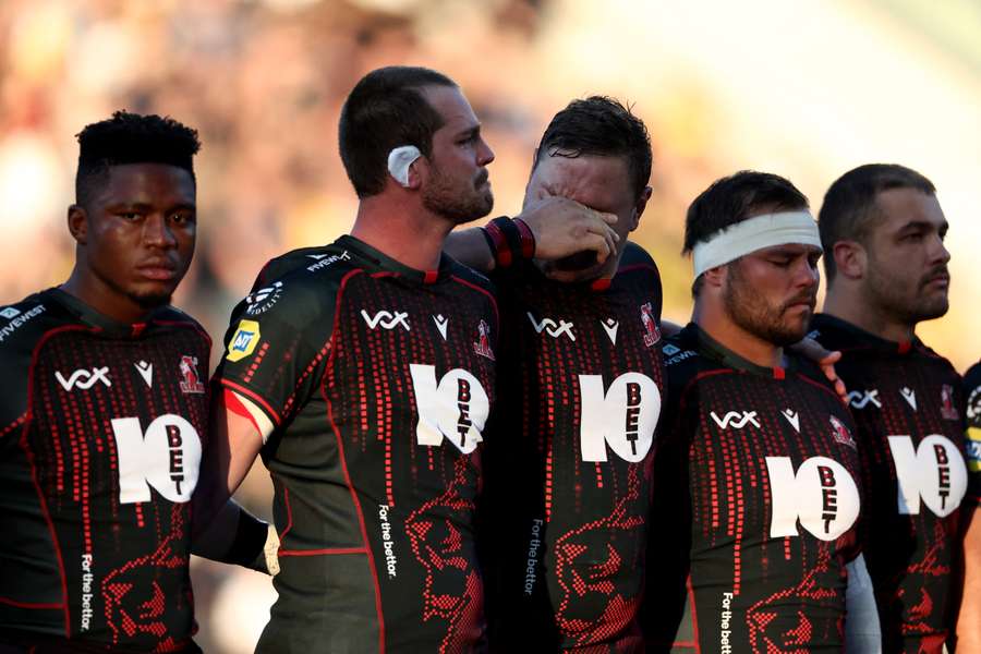 The Lions players show their emotions during the moment of silence The Lions players show their emotions during the moment of silence