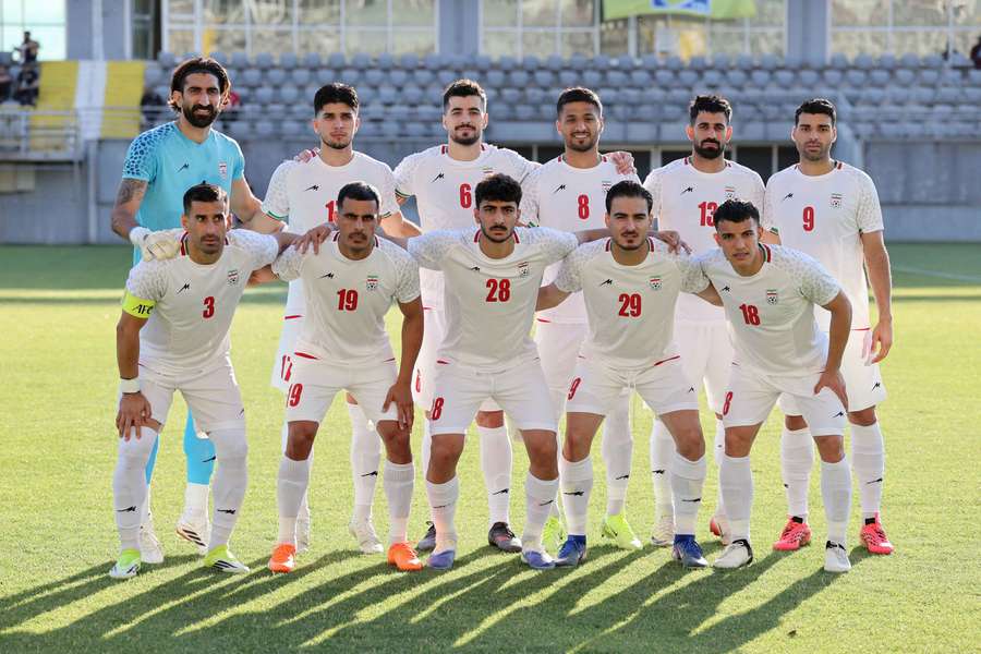 Iran's team poses for a photo ahead of their friendly with Gambia