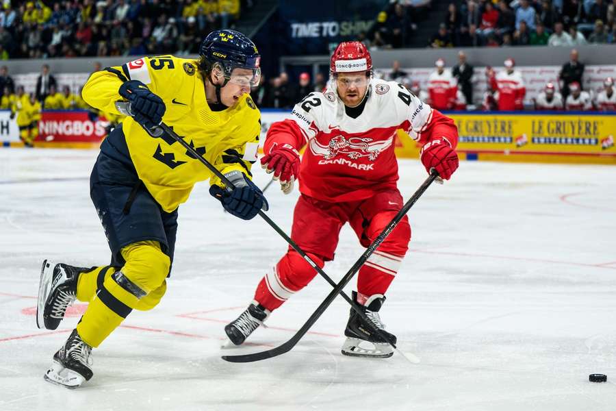 Jack Berglund of Sweden attempts to beat Phillip Bruggisser of Denmark
