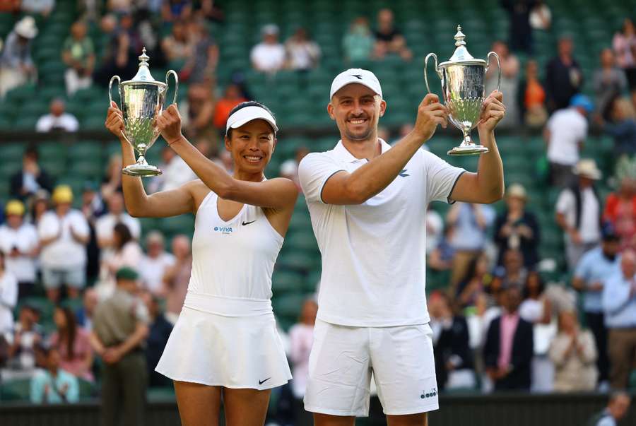 Poland's Jan Zielinski and Taiwan's Su-Wei Hsieh pose for a picture with their trophies