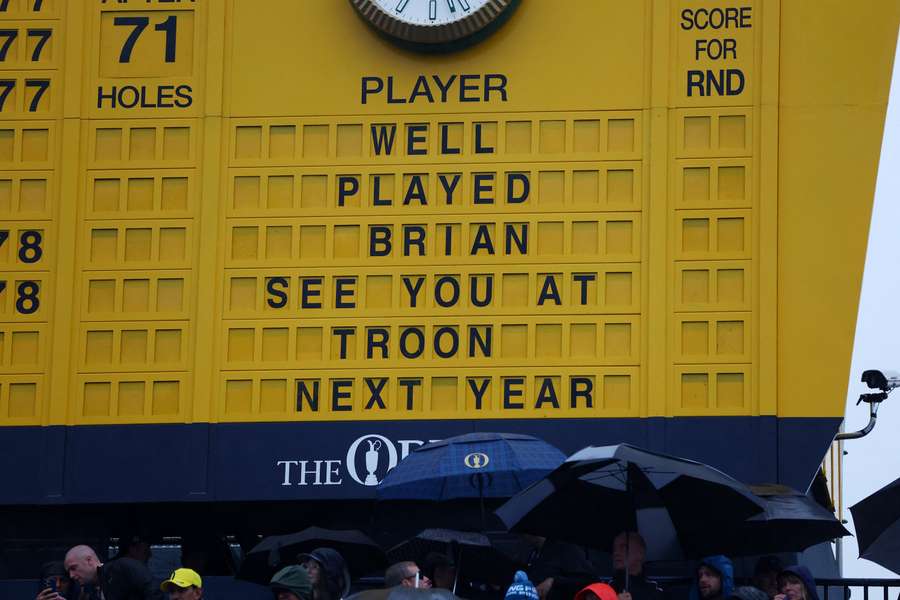 General view of a message on the leaderboard at the 18th green after Brian Harman wins the Open