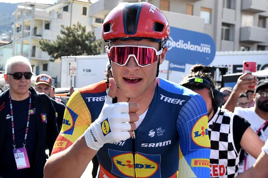 Jonathan Milan celebrates after winning stage four