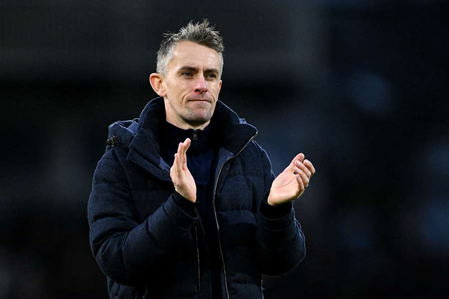 Kieran McKenna, Manager of Ipswich Town, applauds the fans
