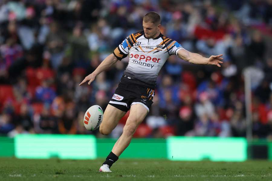 Adam Doueihi kicking the ball away to Newcastle Knights this year.