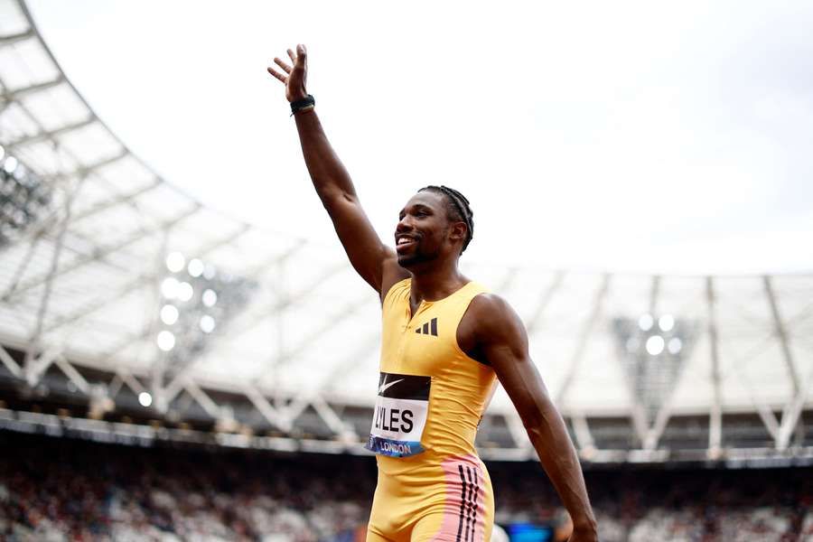 Noah Lyles celebrates after winning the 100m at the London Diamond League