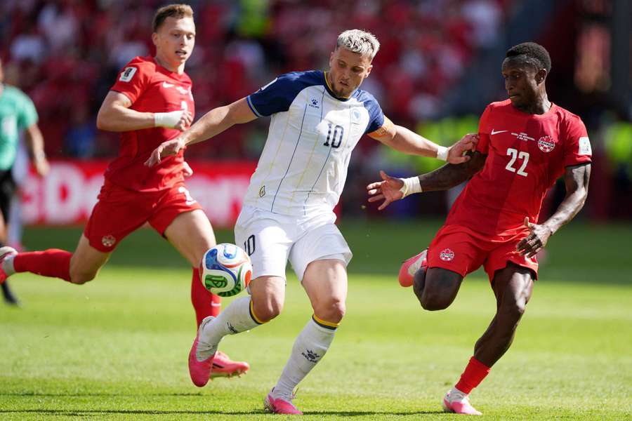 Canada and Bosnia and Herzegovina in action during their Group B World Cup match. Canada and Bosnia and Herzegovina in action during their Group B World Cup match.