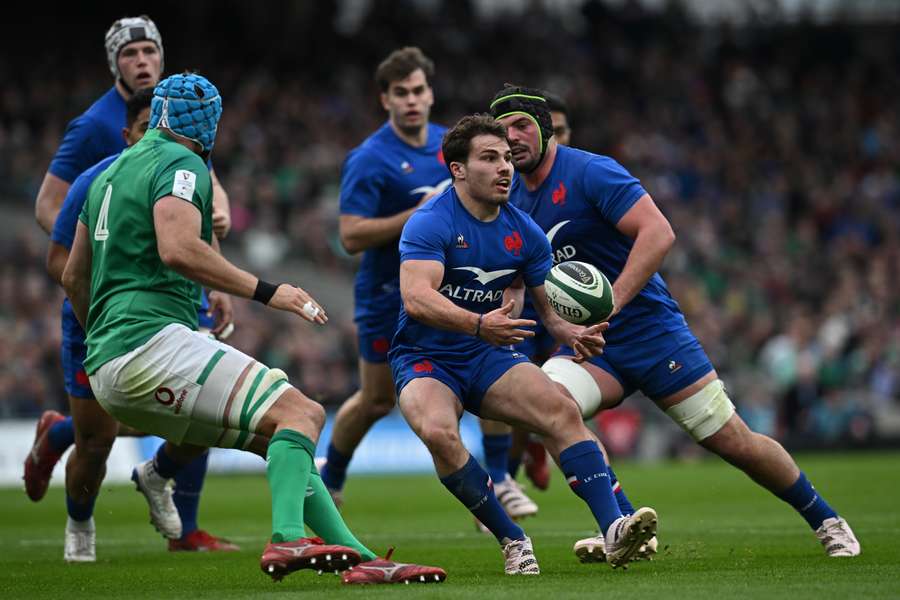 France's scrum-half Antoine Dupont passes the ball during the Six Nations international rugby union match between Ireland and France France's scrum-half Antoine Dupont passes the ball during the Six Nations international rugby union match between Ireland and France