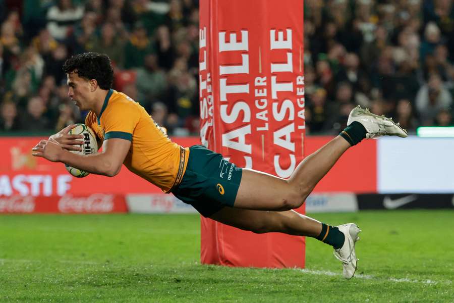 Wallabies winger Joseph Aukuso-Suaalii dives across the line to score at Ellis Park last weekend. 