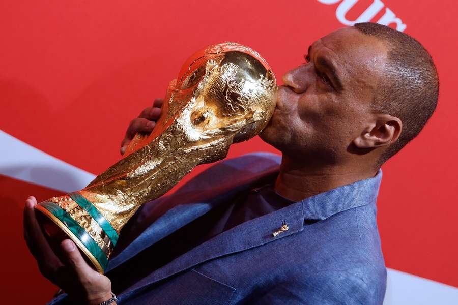 Denilson kisses the World Cup at the FIFA Trophy World Tour event in Sao Paulo, Brazil Denilson kisses the World Cup at the FIFA Trophy World Tour event in Sao Paulo, Brazil