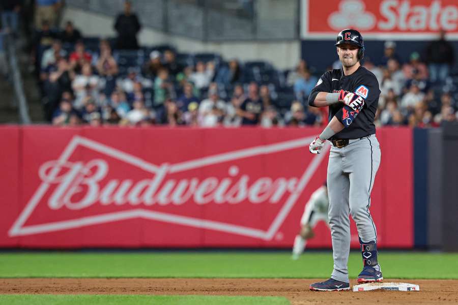 Cleveland Guardians right fielder Lane Thomas reacts after hitting an RBI double during the twelfth inning against the New York Yankees