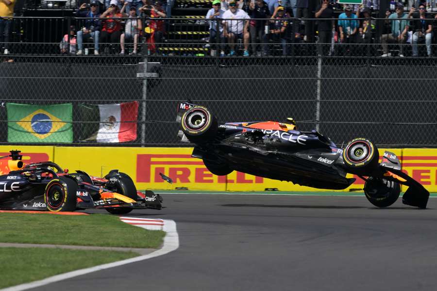 Mexican driver Sergio Perez crashes on the first corner of the Formula One Mexico Grand Prix