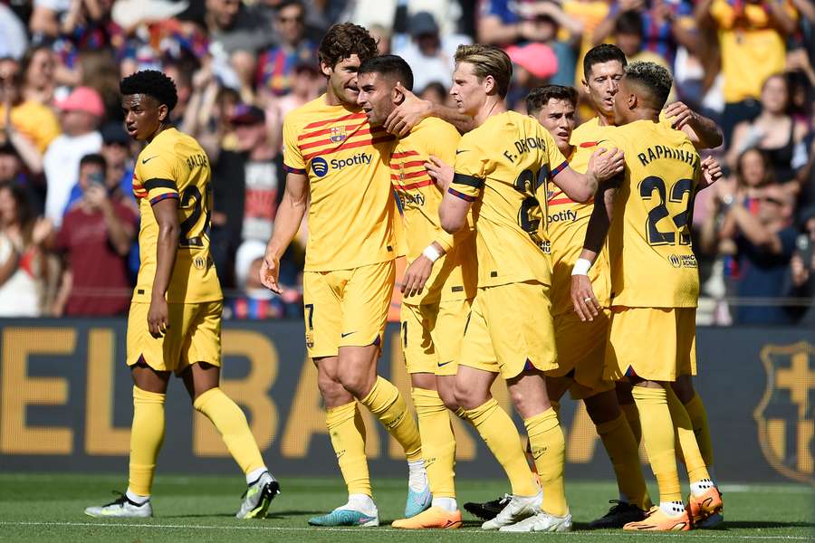 Ferran Torres celebrates with teammates after scoring