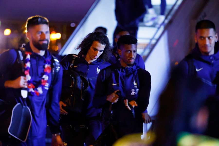 France's defeated World Cup heroes return to acclaim in Paris