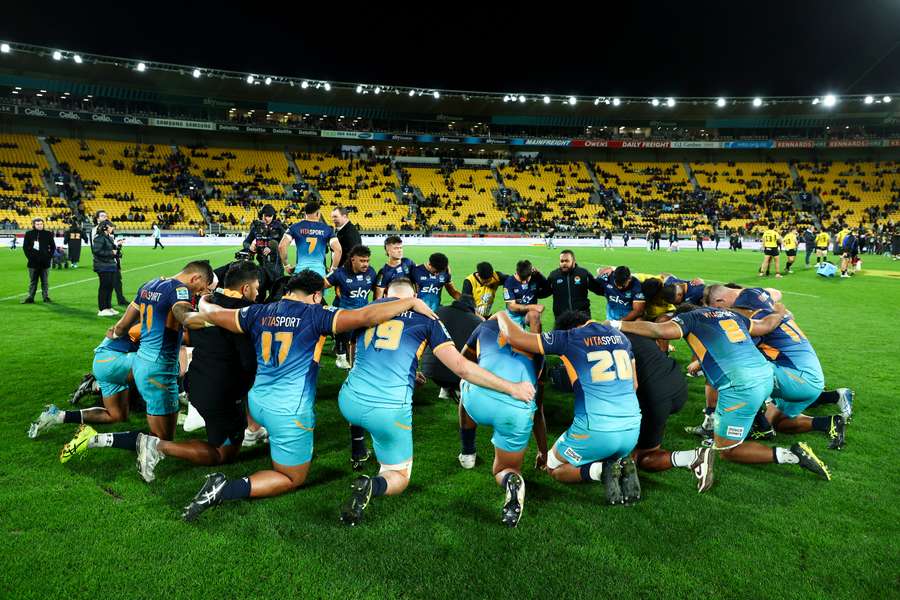 Moana Pasifika players huddle during a Super Rugby game against the Hurricnanes. Moana Pasifika players huddle during a Super Rugby game against the Hurricnanes.
