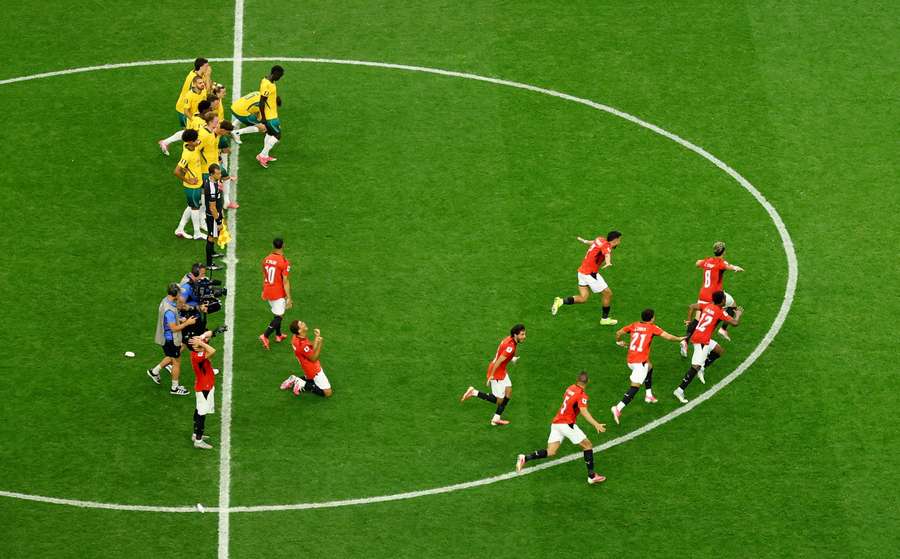 Egypt celebrate their win Egypt celebrate their win