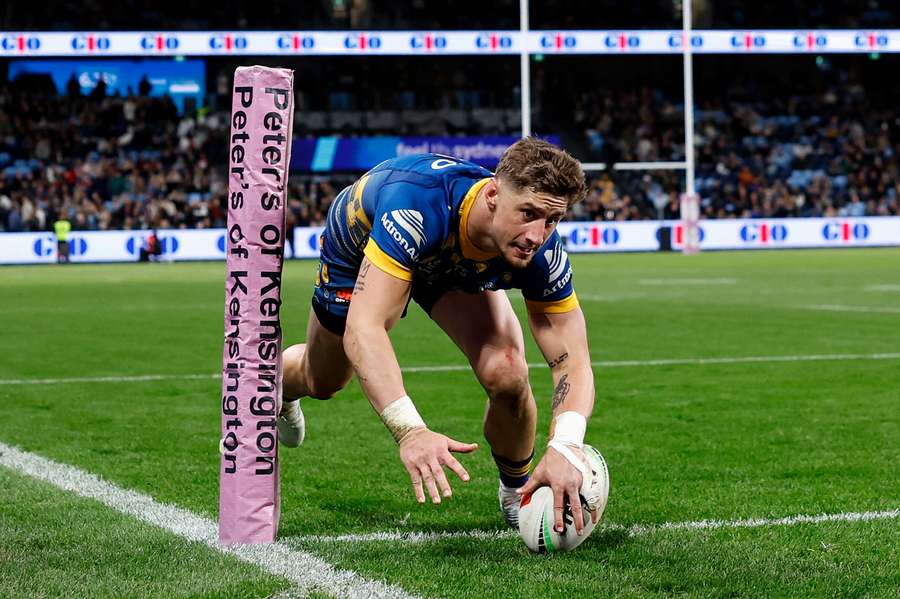 Zac Lomax scores a try in a Round 24 game against South Sydney earlier this year. 